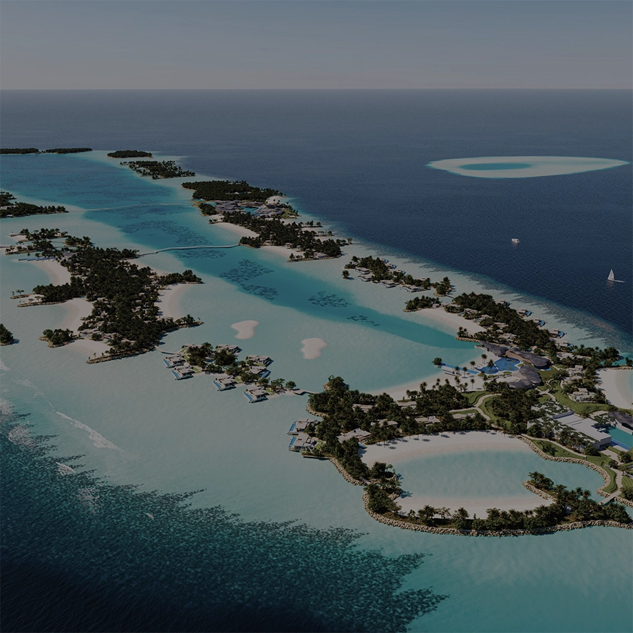 Aerial view of a tropical island resort with overwater villas, sandy beaches, and turquoise lagoons surrounded by deep blue ocean.