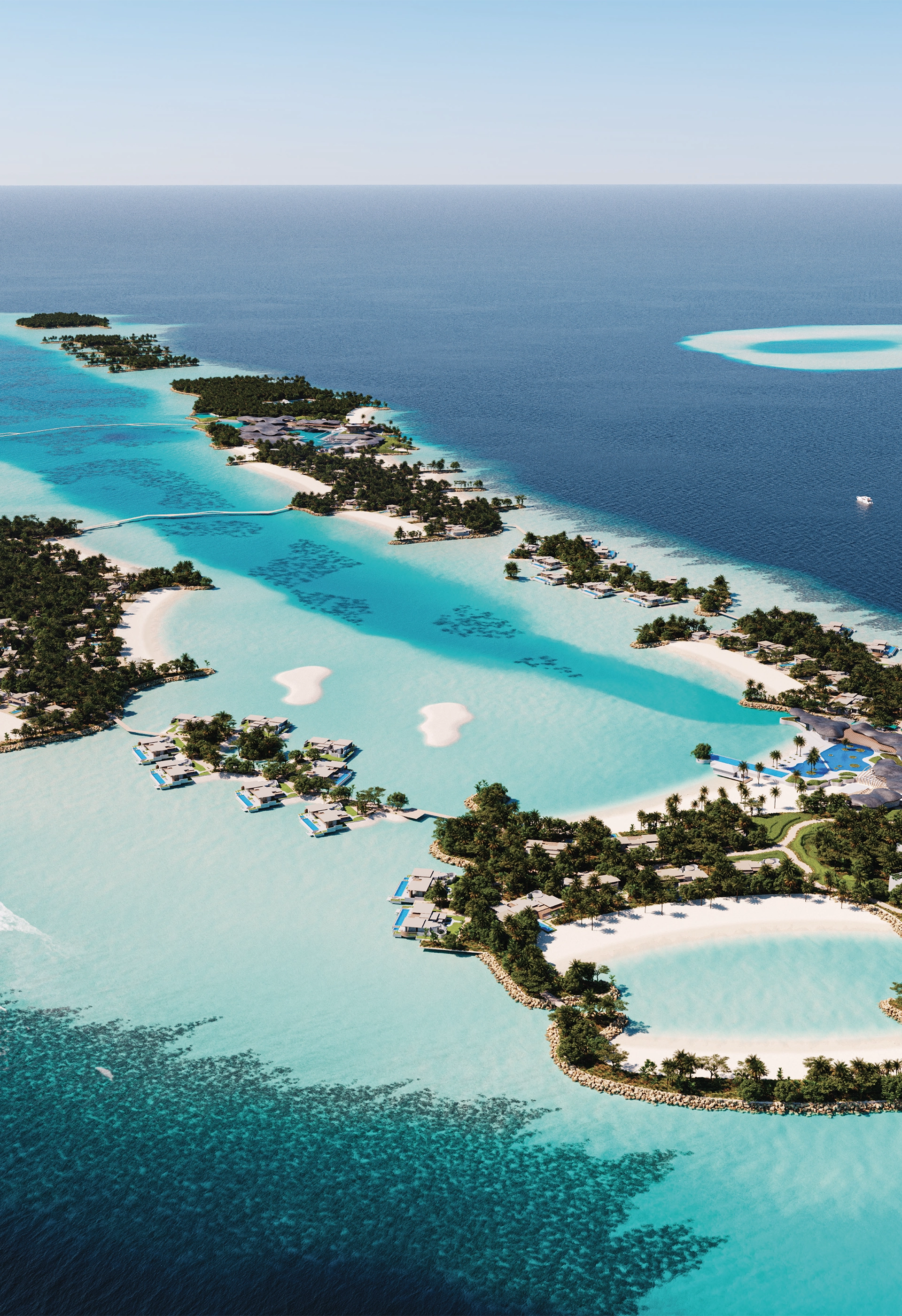 Aerial view of a tropical island resort with turquoise water, sandy beaches, overwater villas, dense greenery, and a boat on the ocean.