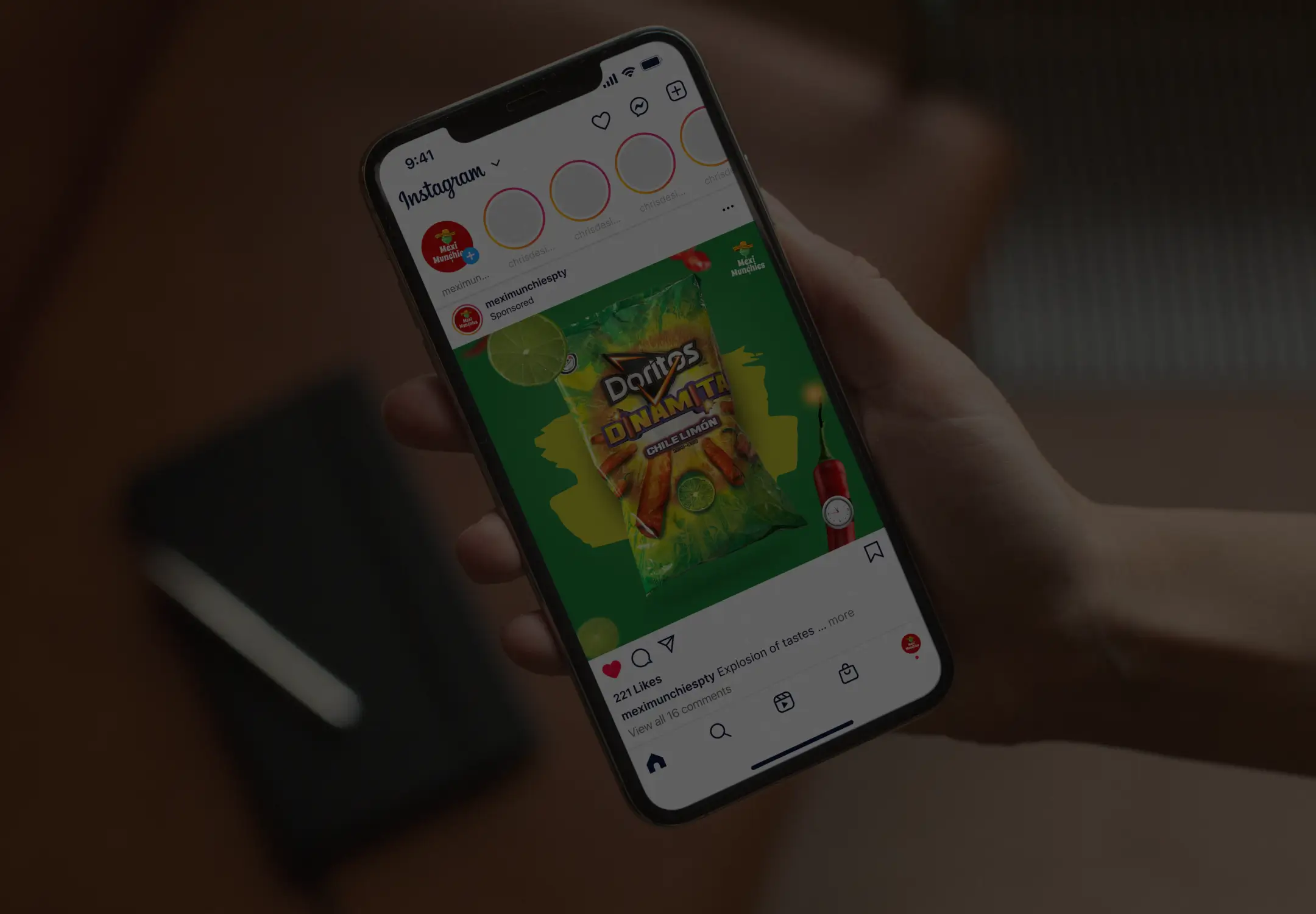 Smartphone screen displaying a sponsored social media advertisement for the Mexi Munchies retail brand in Panama showing a vibrant green snack product layout