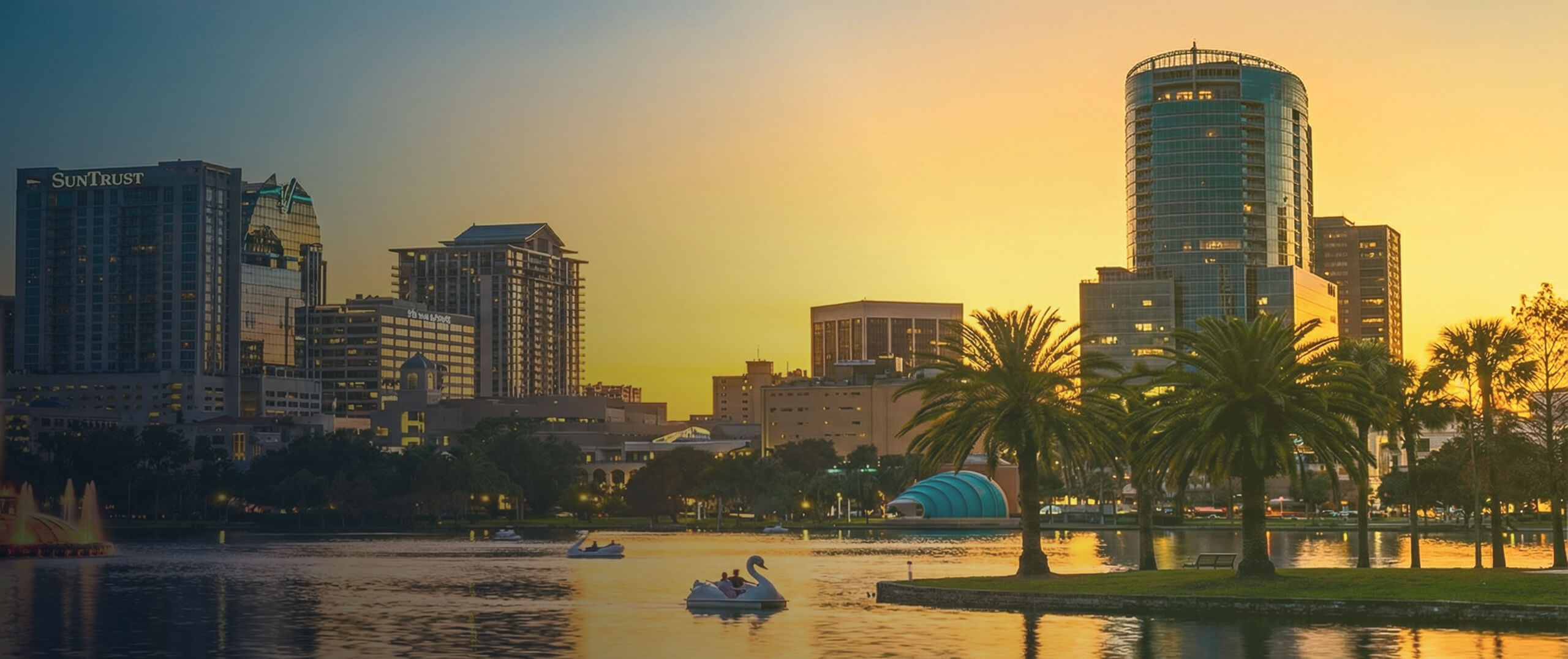 High-rise building behind a lake