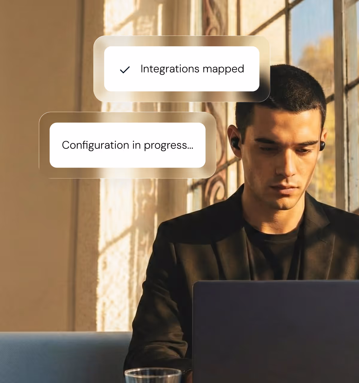 A man using his laptop while sitting down