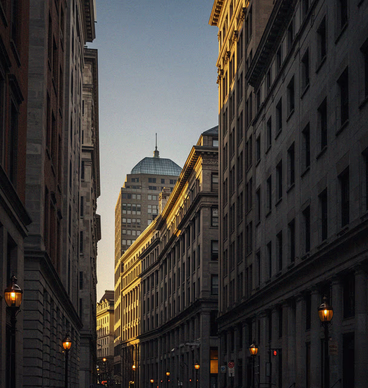 A photo of a street nestled between office buildings