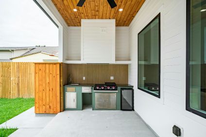 outdoor kitchen under pergola