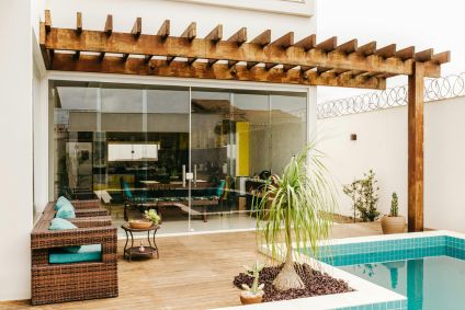 wood pergola by pool