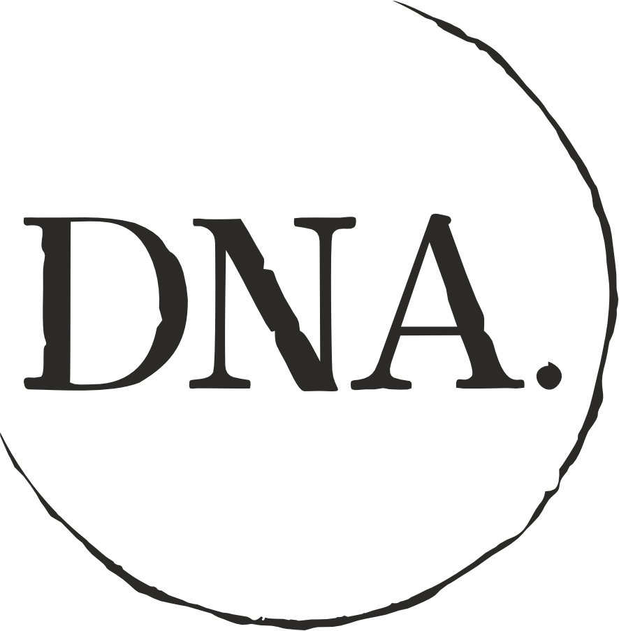 Black uppercase letters DNA followed by a dot inside an irregular circular outline.