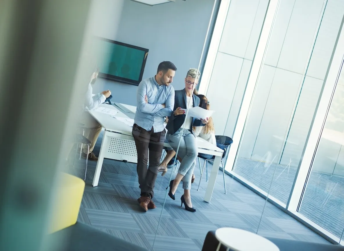 coworkers reviewing document