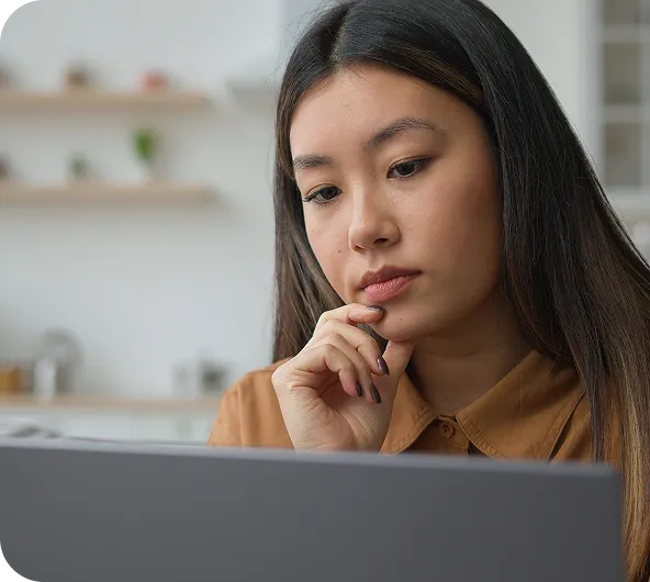 young woman looking at computer