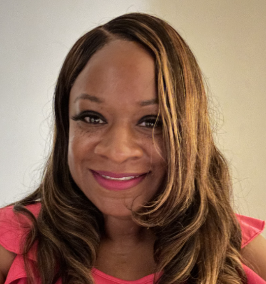 Zynah Brooks smiling in a professional staff headshot