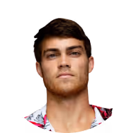Headshot of a young man with short dark hair wearing a white shirt with red patterns.