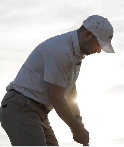 A person playing golf