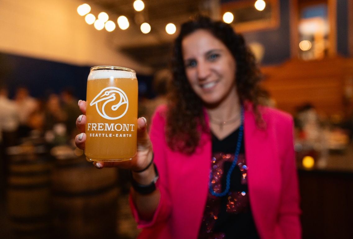 Photo of woman holding beet at Fremont Brweing's Urban Beer Garden