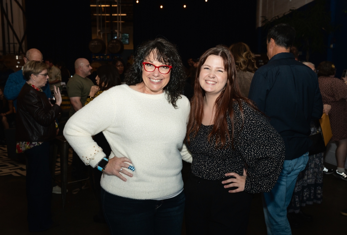 Two women smiling at the Easterseals Washington Fall Fest