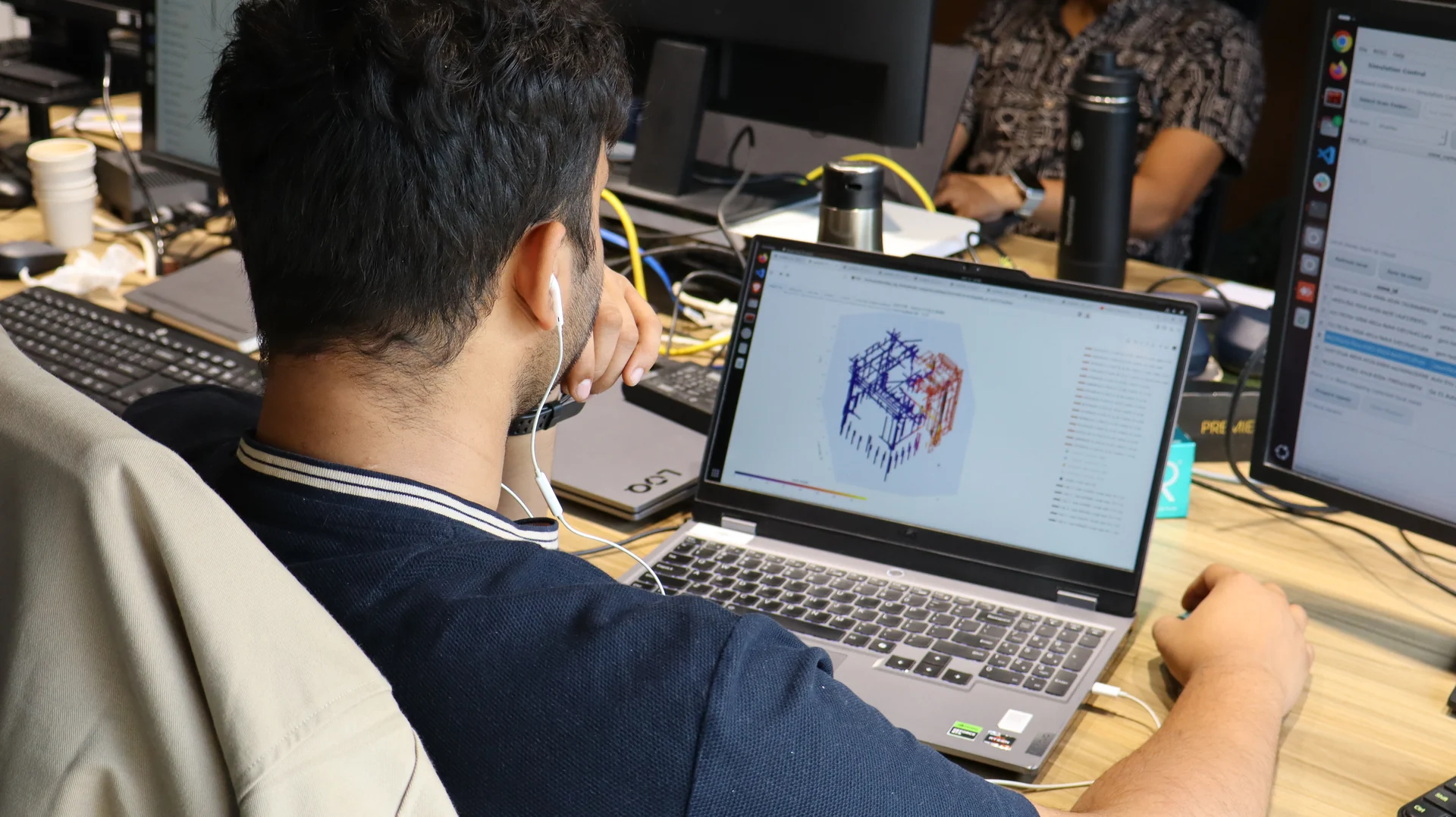 An engineer working on the robot design