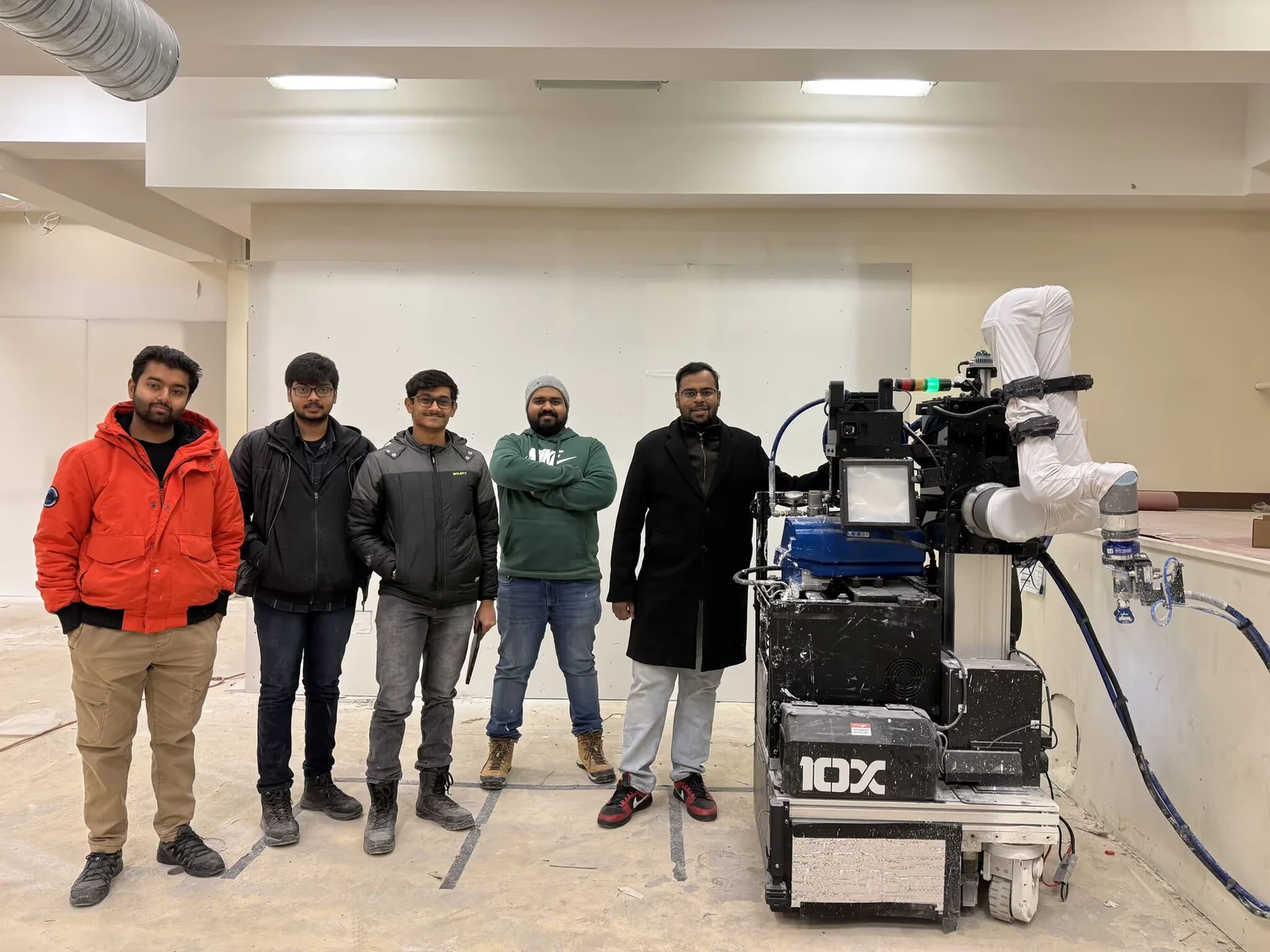 Origin teammates with the robot at a customer site