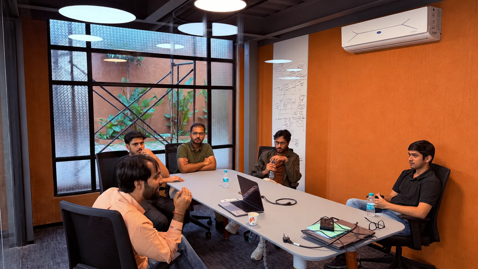 A team meeting in the Origin office