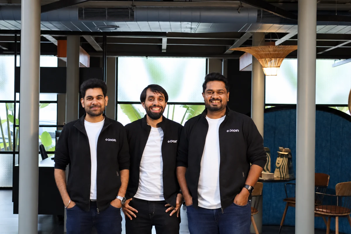 Origin founders in the robotics workspace