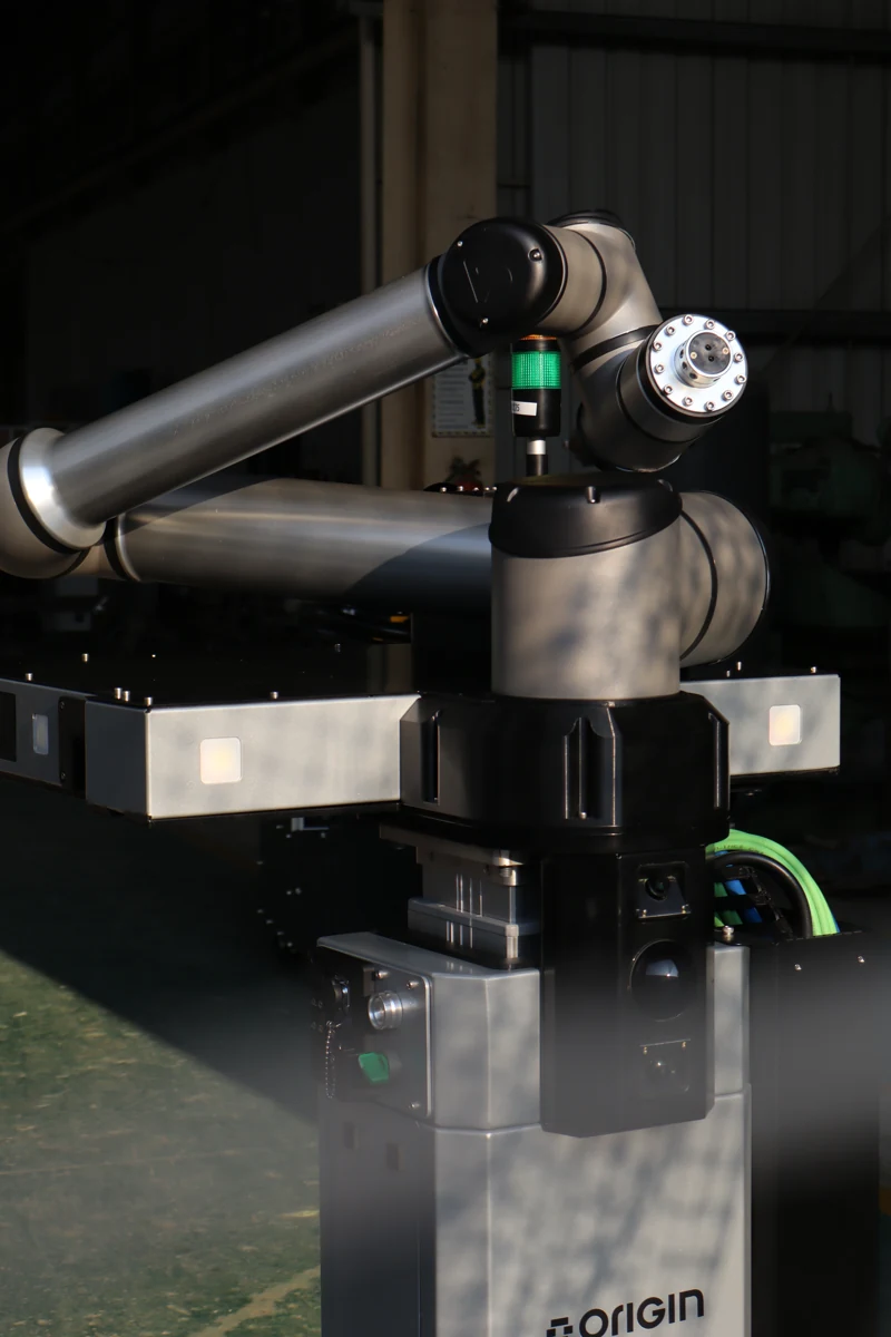 Close-up of the robot arm and tooling