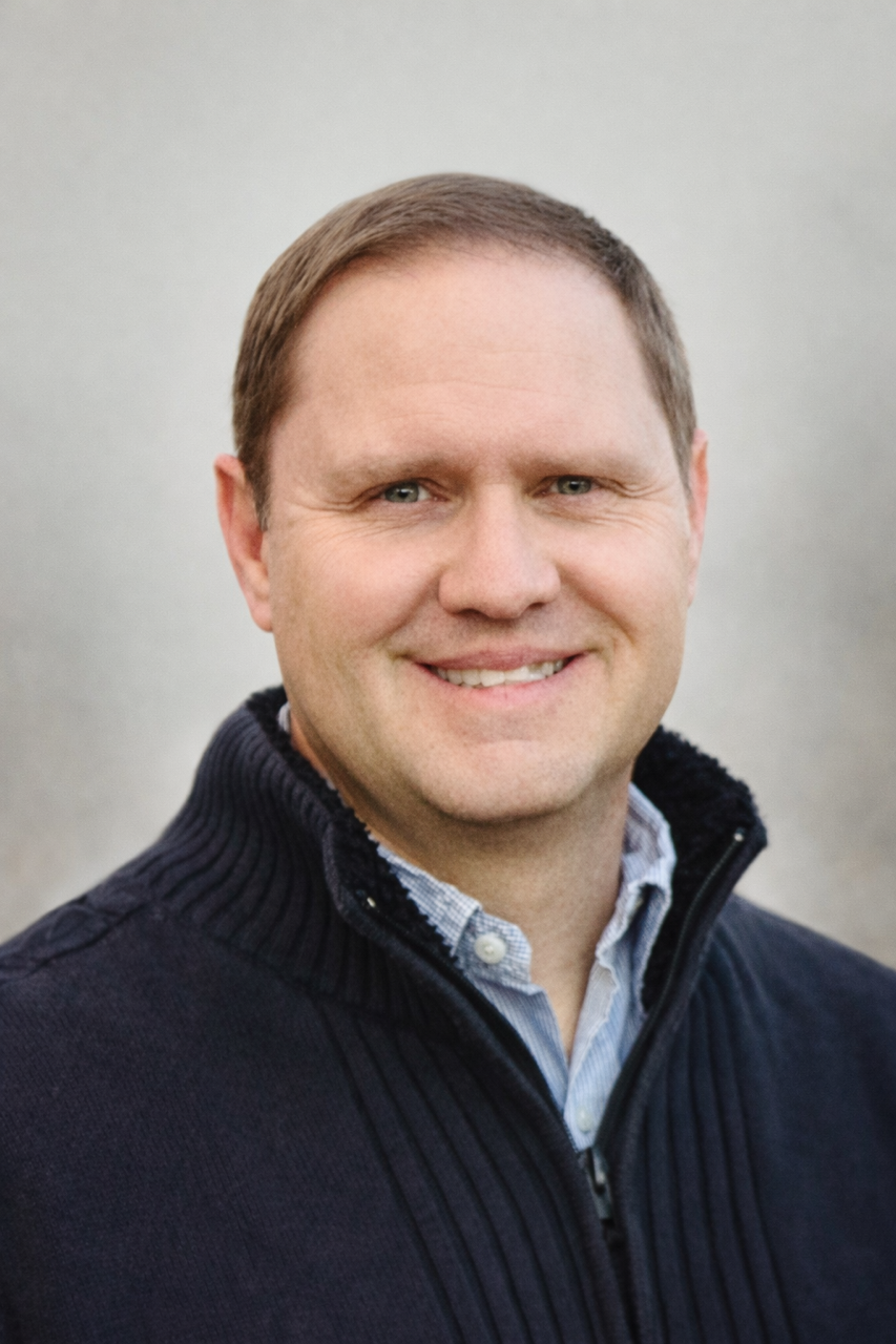 [headshot] image of satisfied customer shaking hands with company representative (for a fintech company)