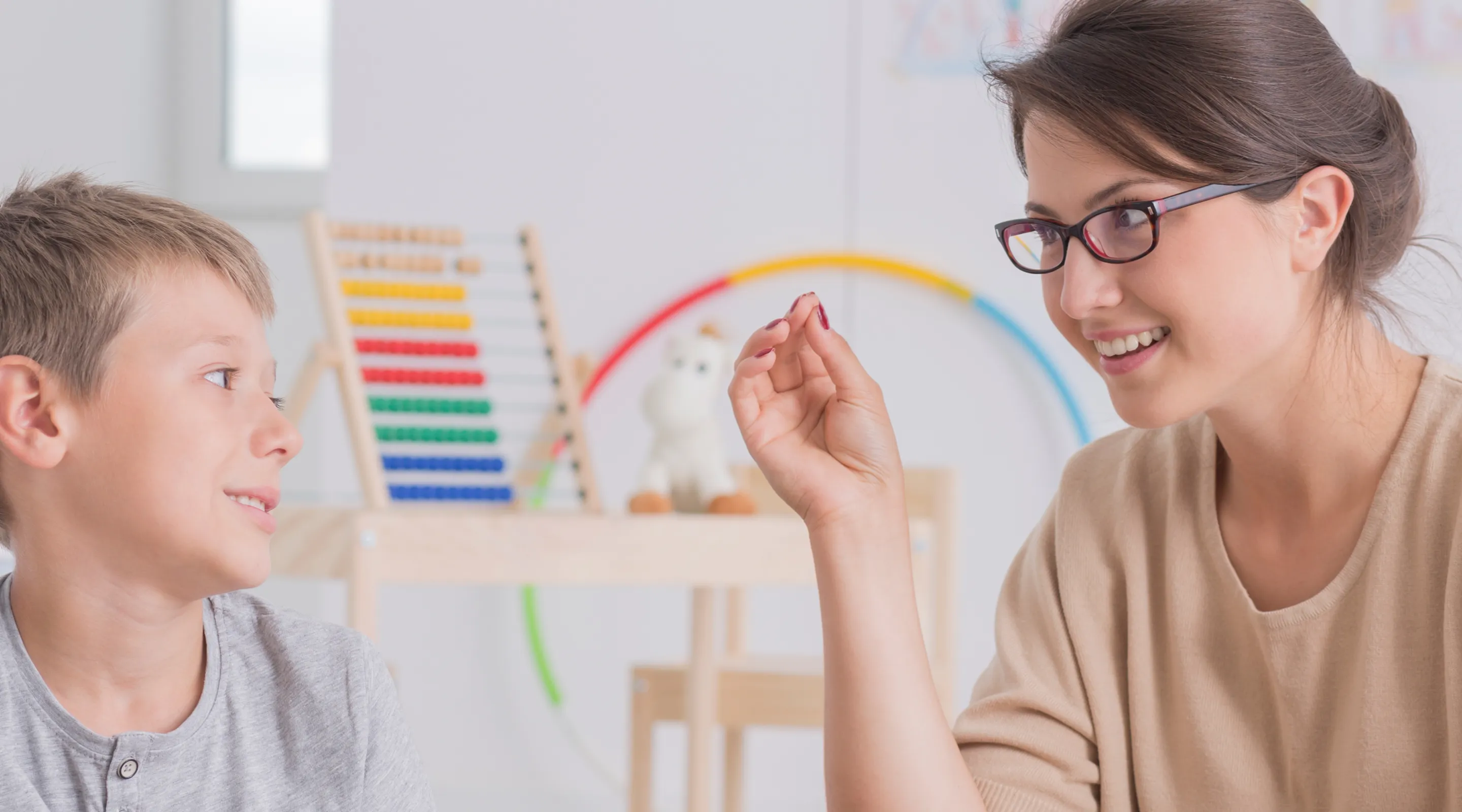 Professional vision therapy session for child with visual perception and reading challenges