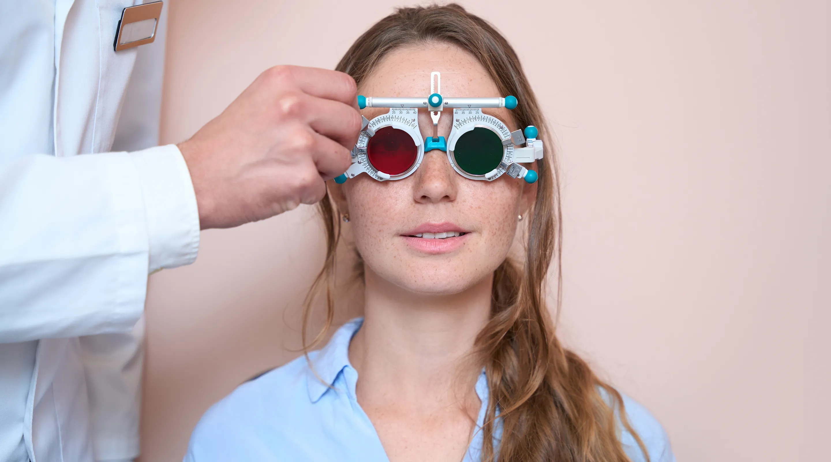 Professional eye test using phoropter trial frame to determine accurate vision prescription