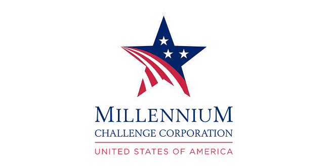 Logo with a blue star featuring white smaller stars and red and white stripes, with text 'Millennium Challenge Corporation United States of America'.