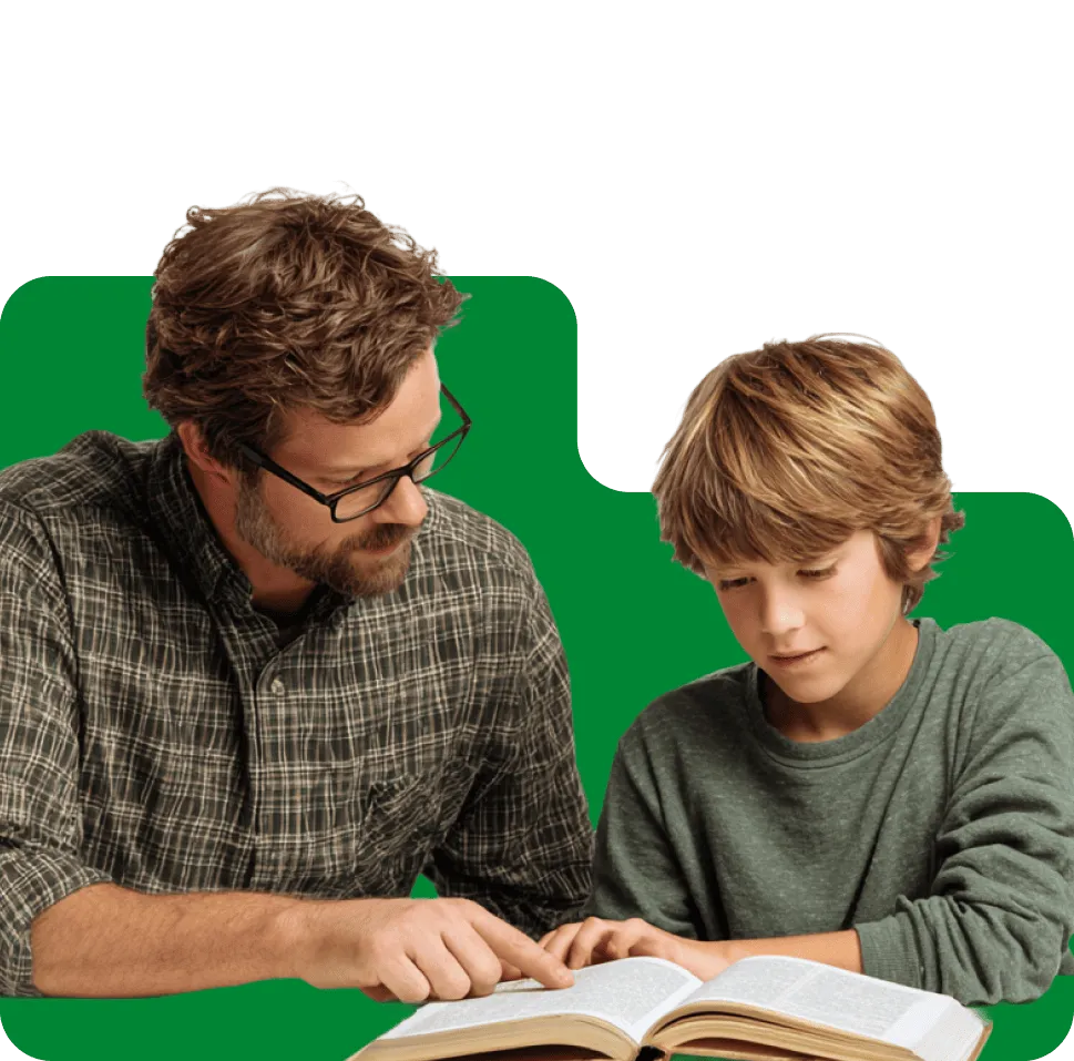 a teacher and a boy are reading book
