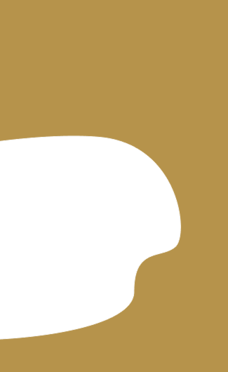 Abstract organic black shape on a golden brown background.