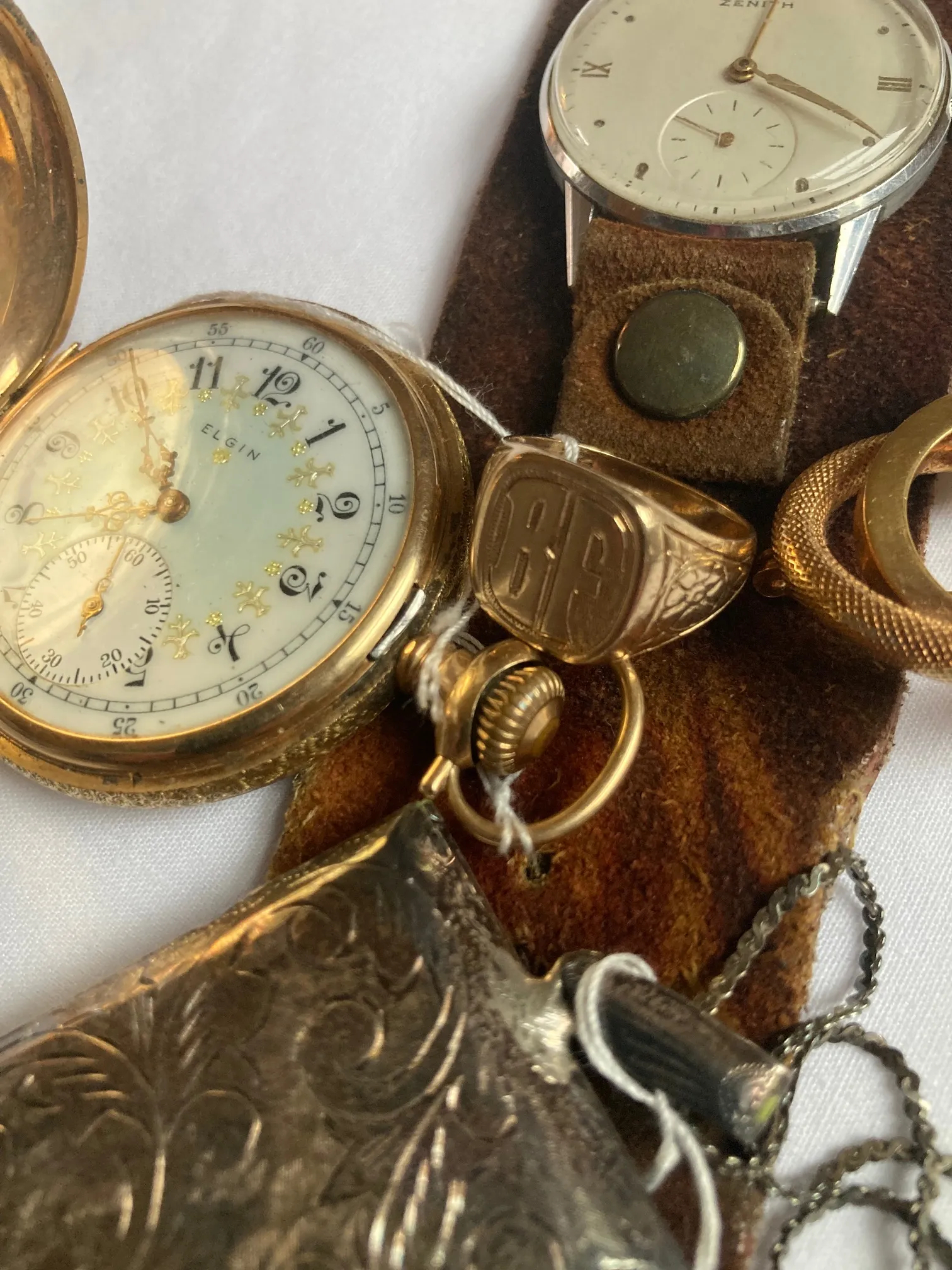 Montres de poche anciennes, chevalière et bijoux en or à évaluer