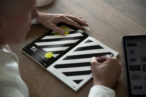 Sketchbook mockup perfect for presenting logo sketches or your design process.