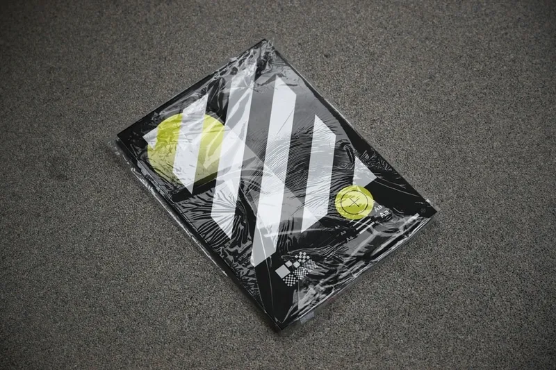 Magazine cover mockup wrapped in plastic foil.