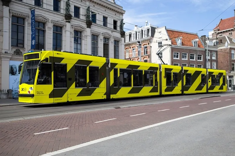 Unique Amsterdam tram wrap mockup. Full photorealistic 3D wrapping and easily editable for to design. 