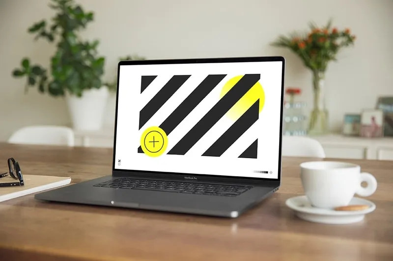 Macbook Pro mockup in warm living room setting