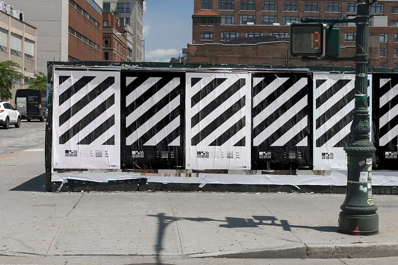 Glued poster wall with rippled paper effect