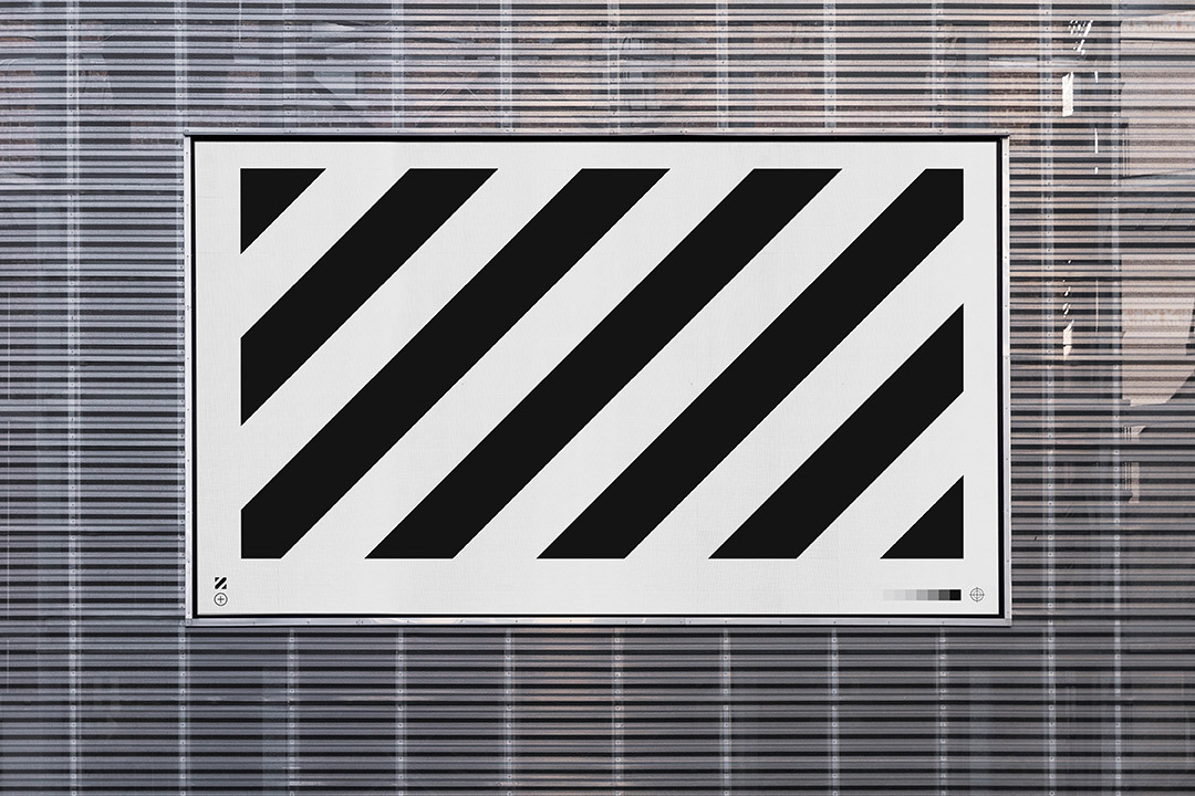 Minimal horizontal banner mockup on steel fence background.
