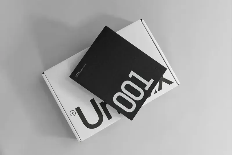 Packaging mockup containing 2 highly editable cardboard boxes. Box mockup in studio setting with editable background.