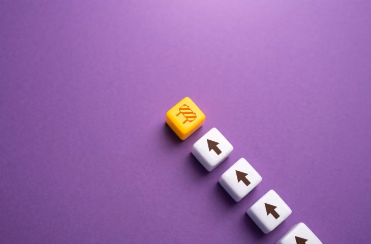 Four raised keyboard keys arranged diagonally on a purple background: one yellow key with an orange branching arrow symbol, followed by three white keys with black mouse-pointer icons.