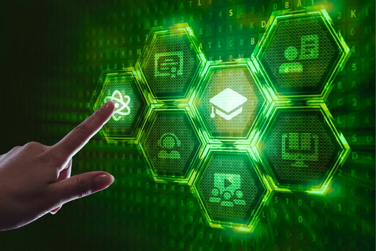 Hand touching digital hexagon icons including education cap, atom, and user symbols on green background.