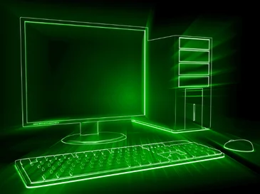 Green neon outline of desktop computer setup with monitor, tower, keyboard, and mouse on black background.