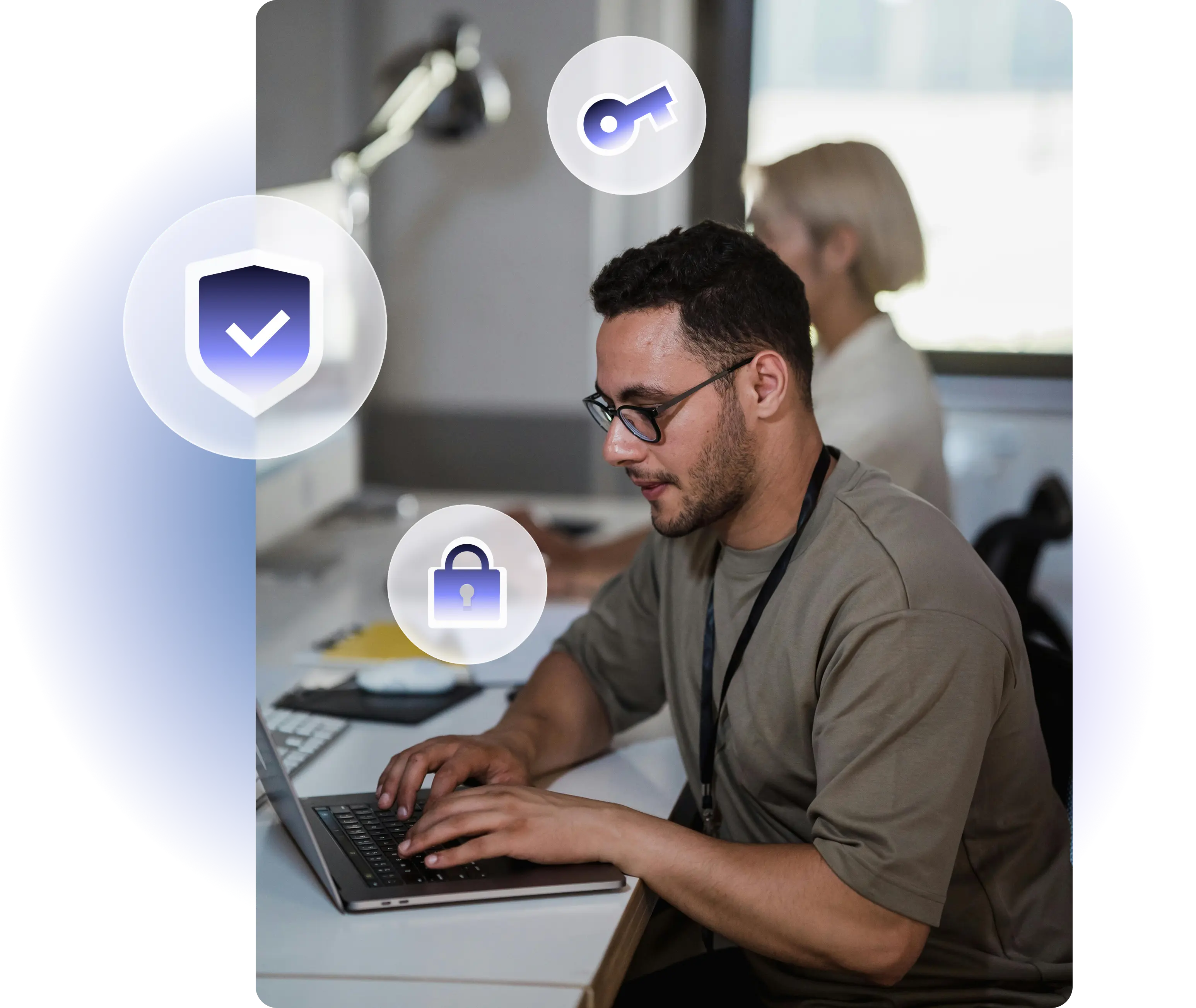 A professional at a laptop surrounded by security icons representing encryption and access control