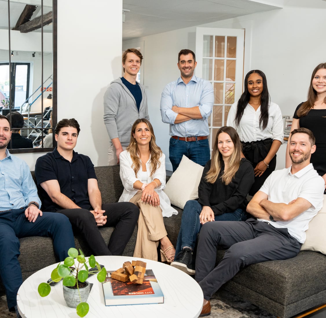 The Alternative Payments team posed together in an office