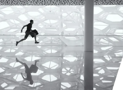 a man is running through a building
