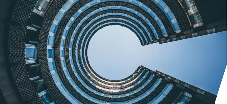 a very tall building with a sky in the background