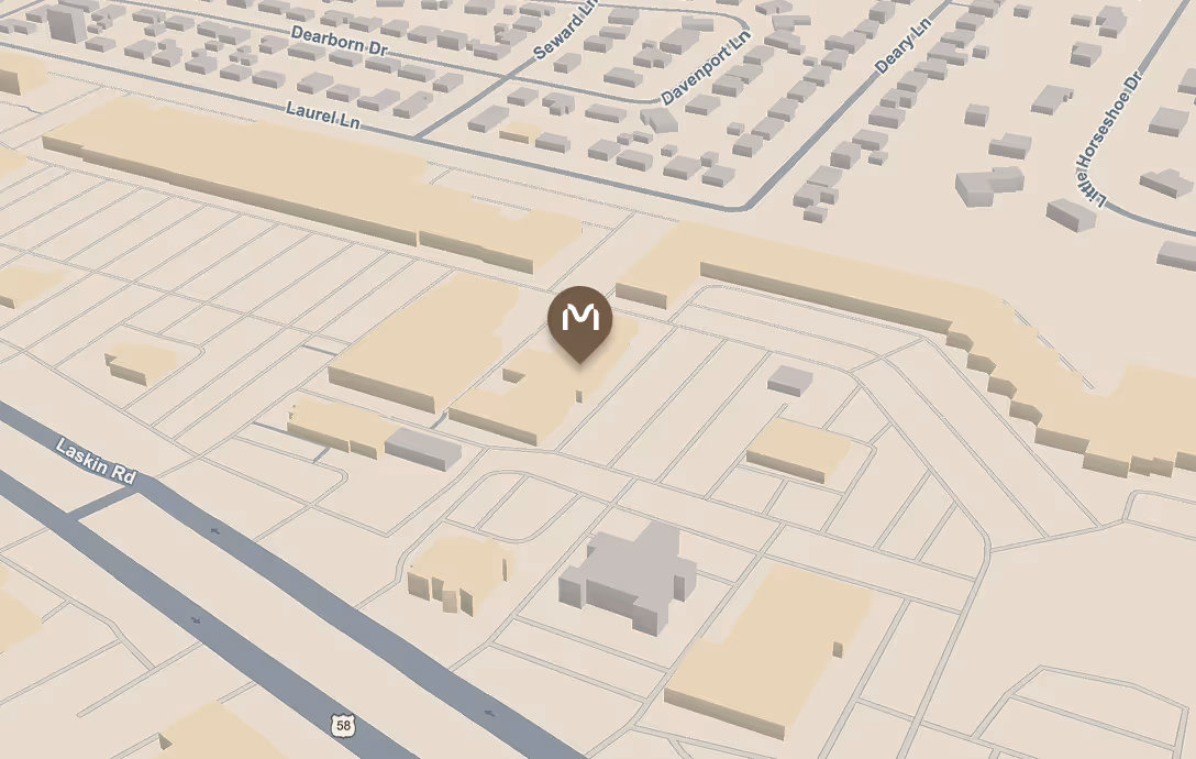 3D rendered map showing streets and buildings with a location marker near Laskin Rd and Laurel Ln.