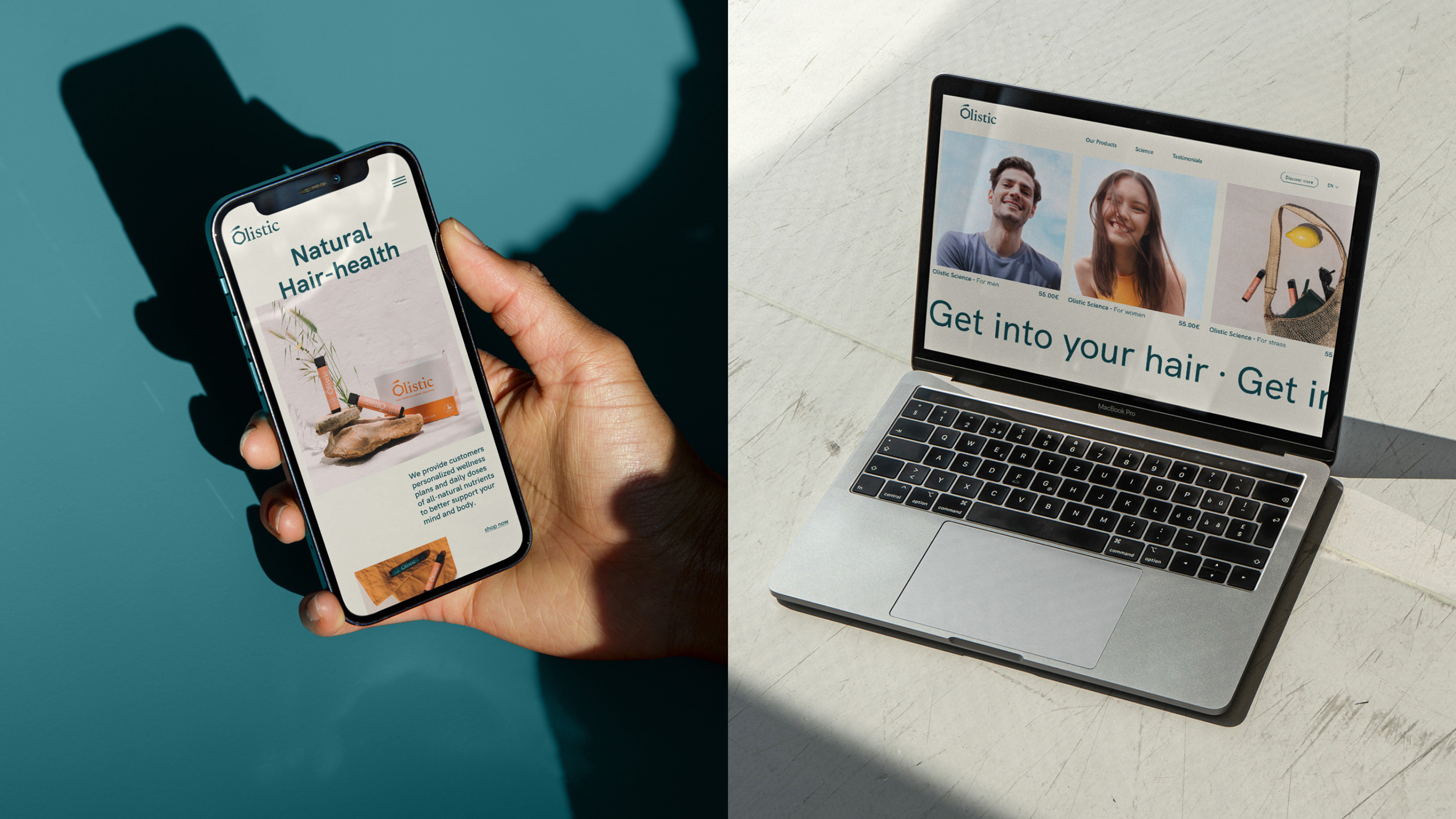Una mano sostiene un teléfono móvil que muestra un sitio web sobre salud natural del cabello llamado Olistic, y una computadora portátil abierta con una página del mismo sitio mostrando productos para el cuidado del cabello.
