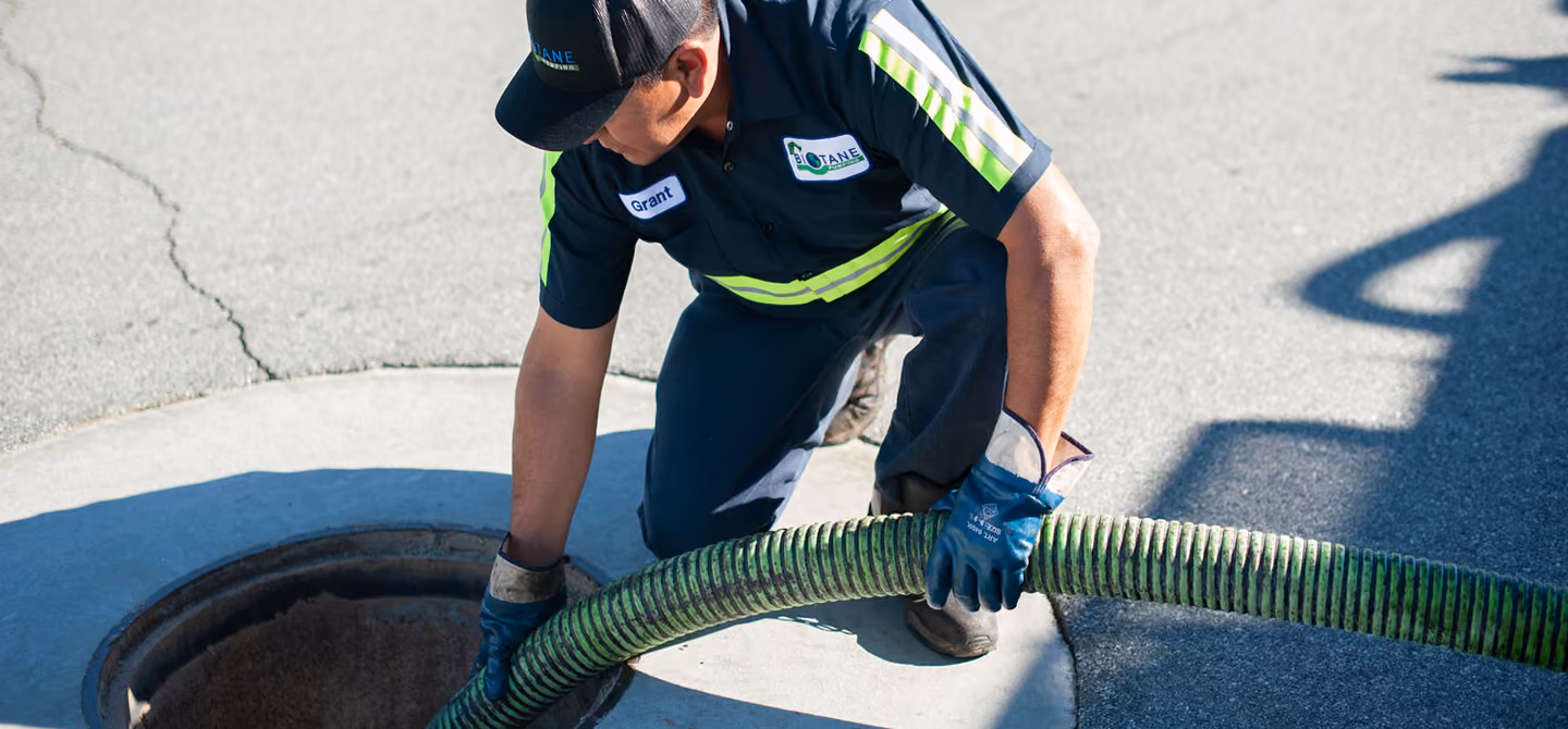 Allpro worker pumping grease trap