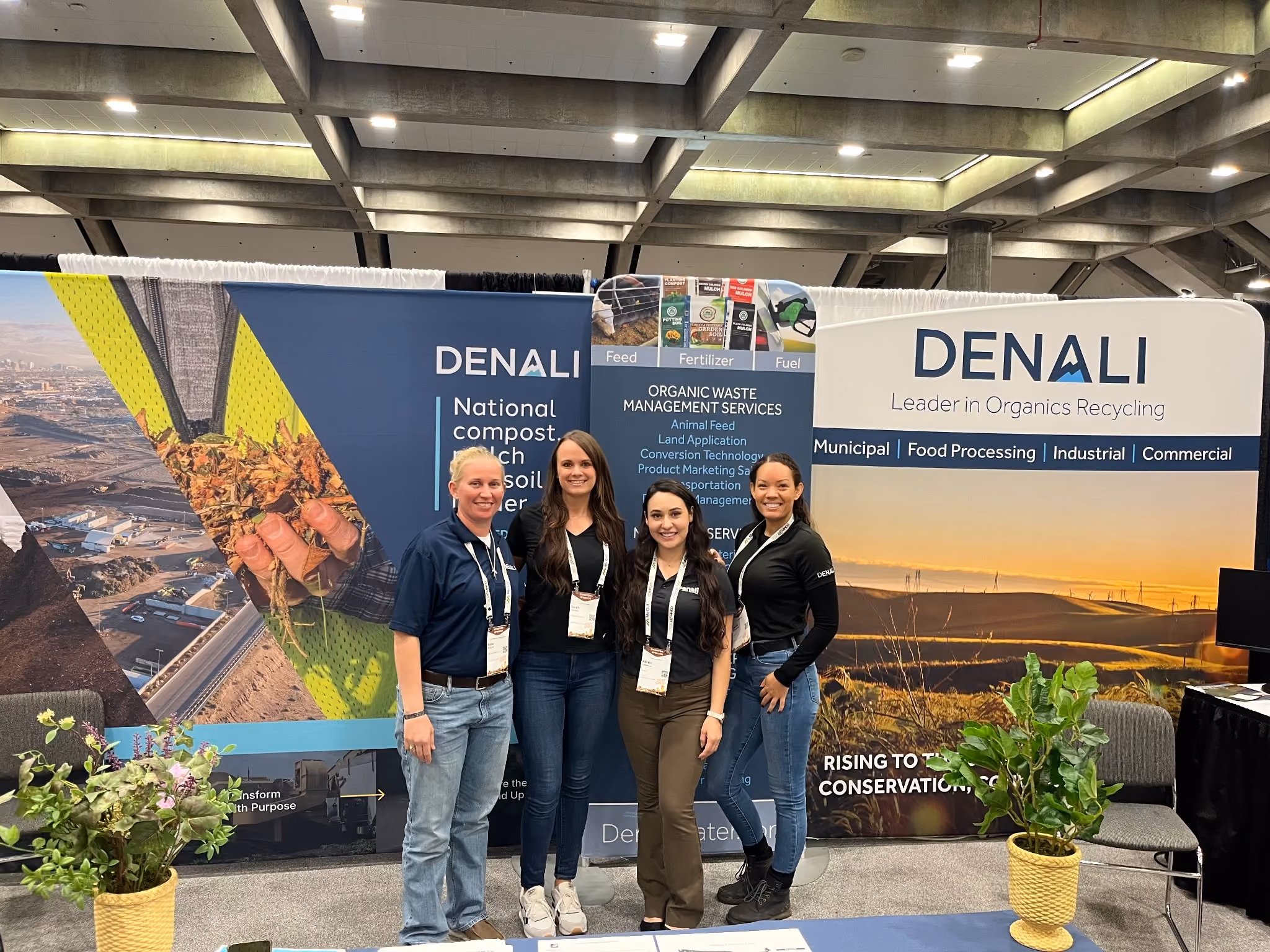 Denali team standing in front of booth background at COMPOST 2026.