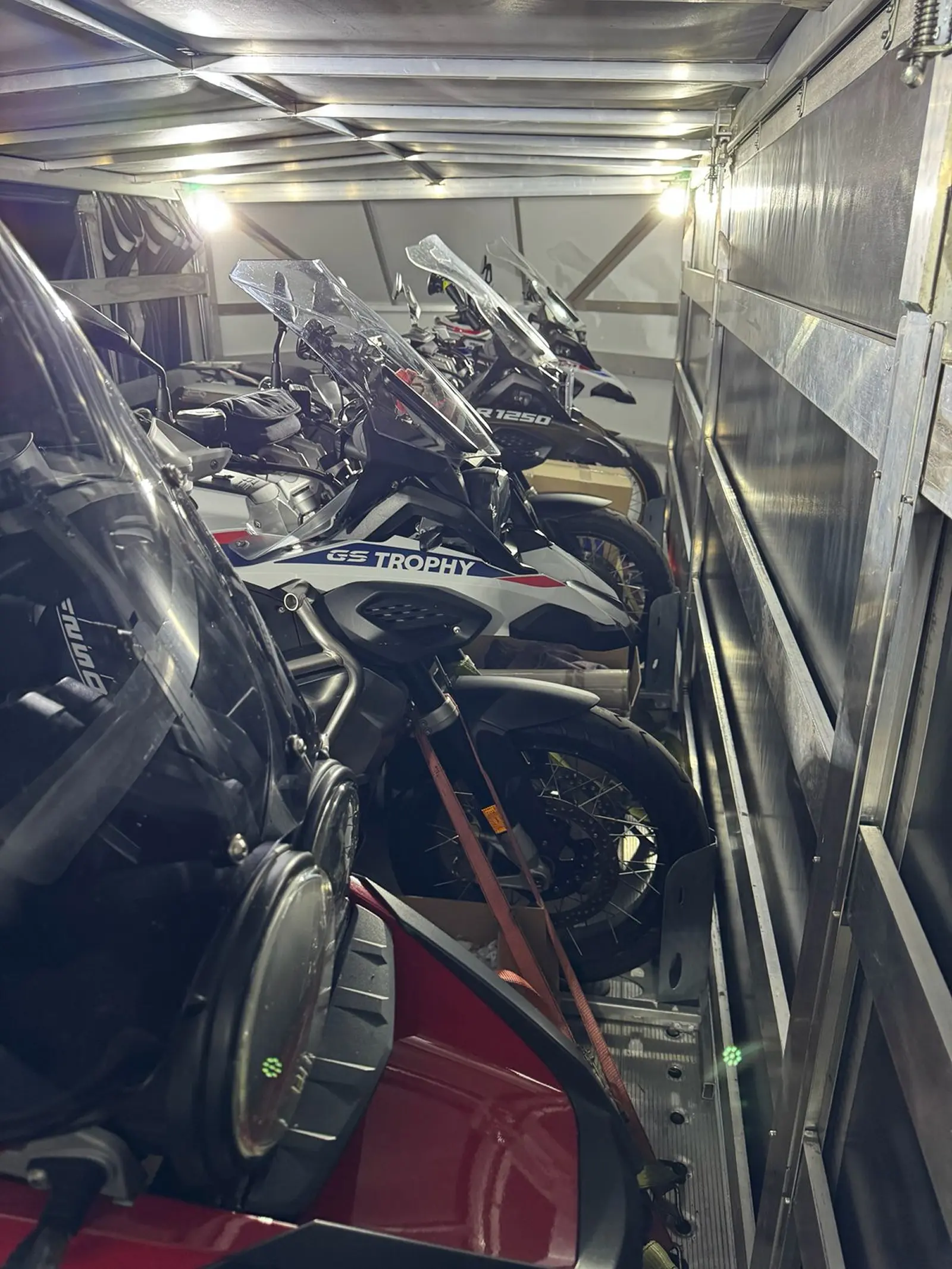 Front securing of motorcycles properly positioned inside an enclosed trailer.