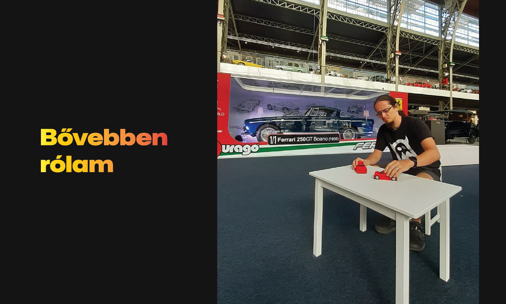 Man with glasses and beard, arms crossed, wearing a graphic t-shirt with a van illustration on a black background.