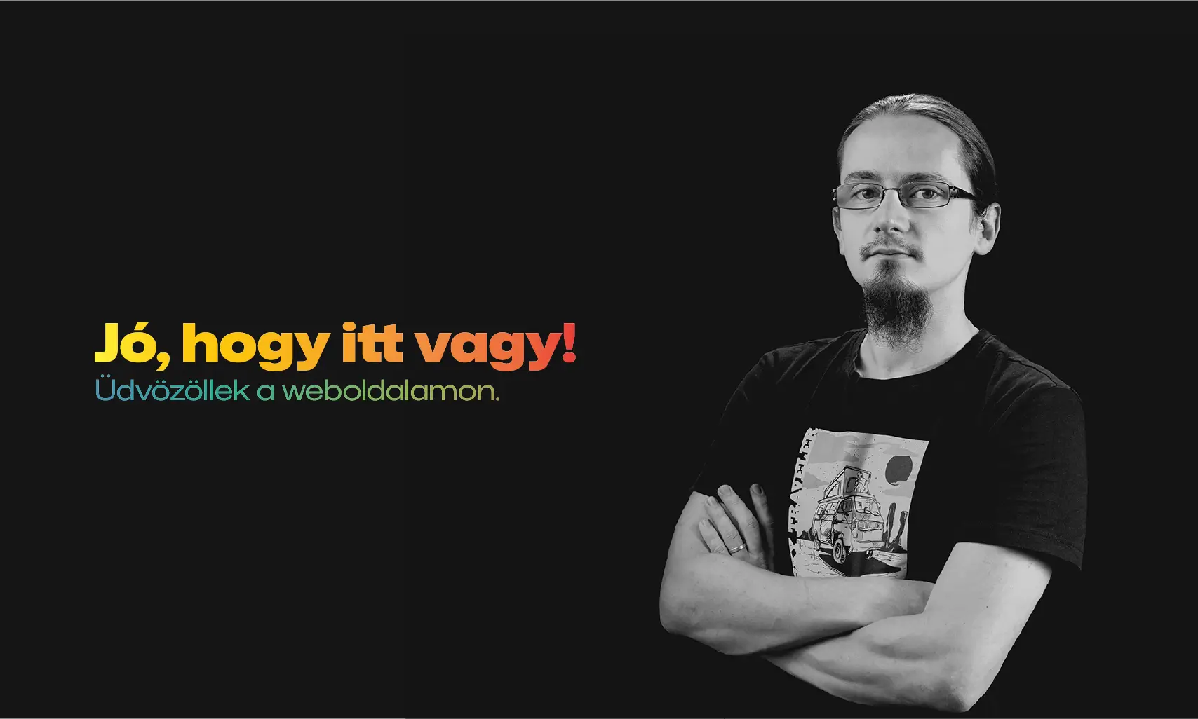 Man with glasses and beard standing with arms crossed wearing a black t-shirt featuring a van illustration, next to welcoming text in Hungarian.