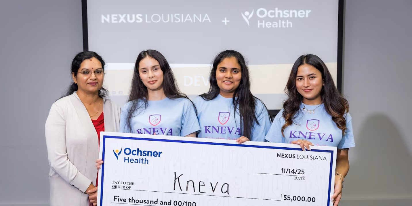 Champions of the DevDays HealthTech Challenge, Yukta Karki, SianRose Vincent, and Nirjara KC, pictured with their faculty advisor Prasanthi Sreekumari, awarded $5,000 prize.